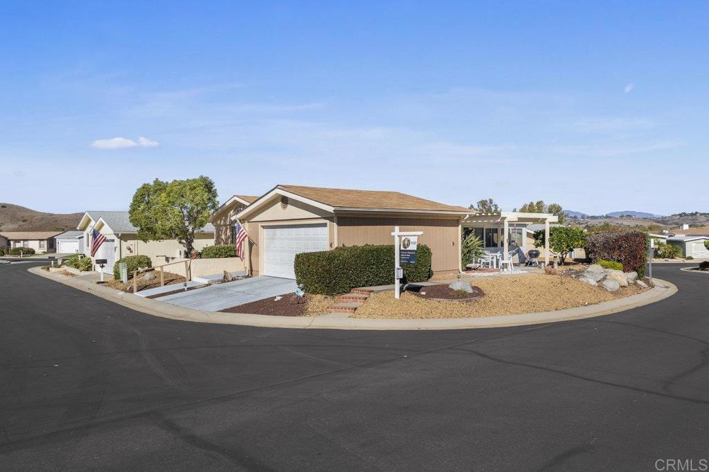 1476 Dover Street Oceanside, CA 92057 - Photo 3 of 45 a view of a street with houses