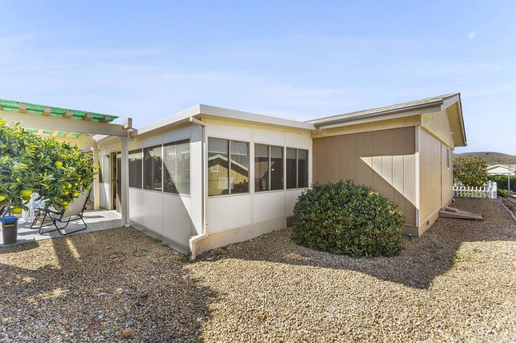 1476 Dover Street Oceanside, CA 92057 - Photo 33 of 45 a front view of a house with garden