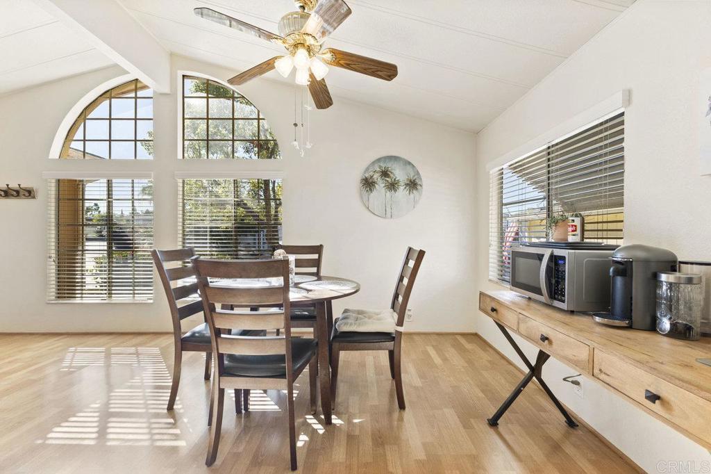 1476 Dover Street Oceanside, CA 92057 - Photo 10 of 45 a view of a dining room with furniture window and wooden floor