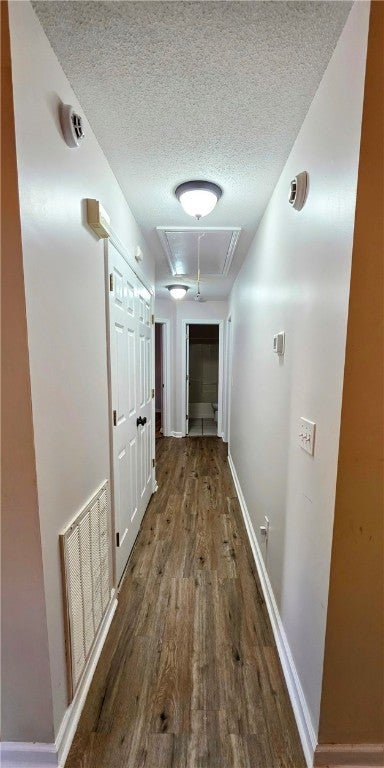 709 Groce Street Opelika, AL 36801 - Photo 10 of 31 Hall to bedrooms with Laundry Closet to the left