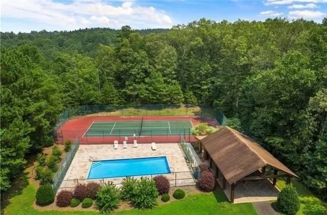 a view of a yard with a bench