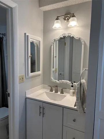 a room with a dresser