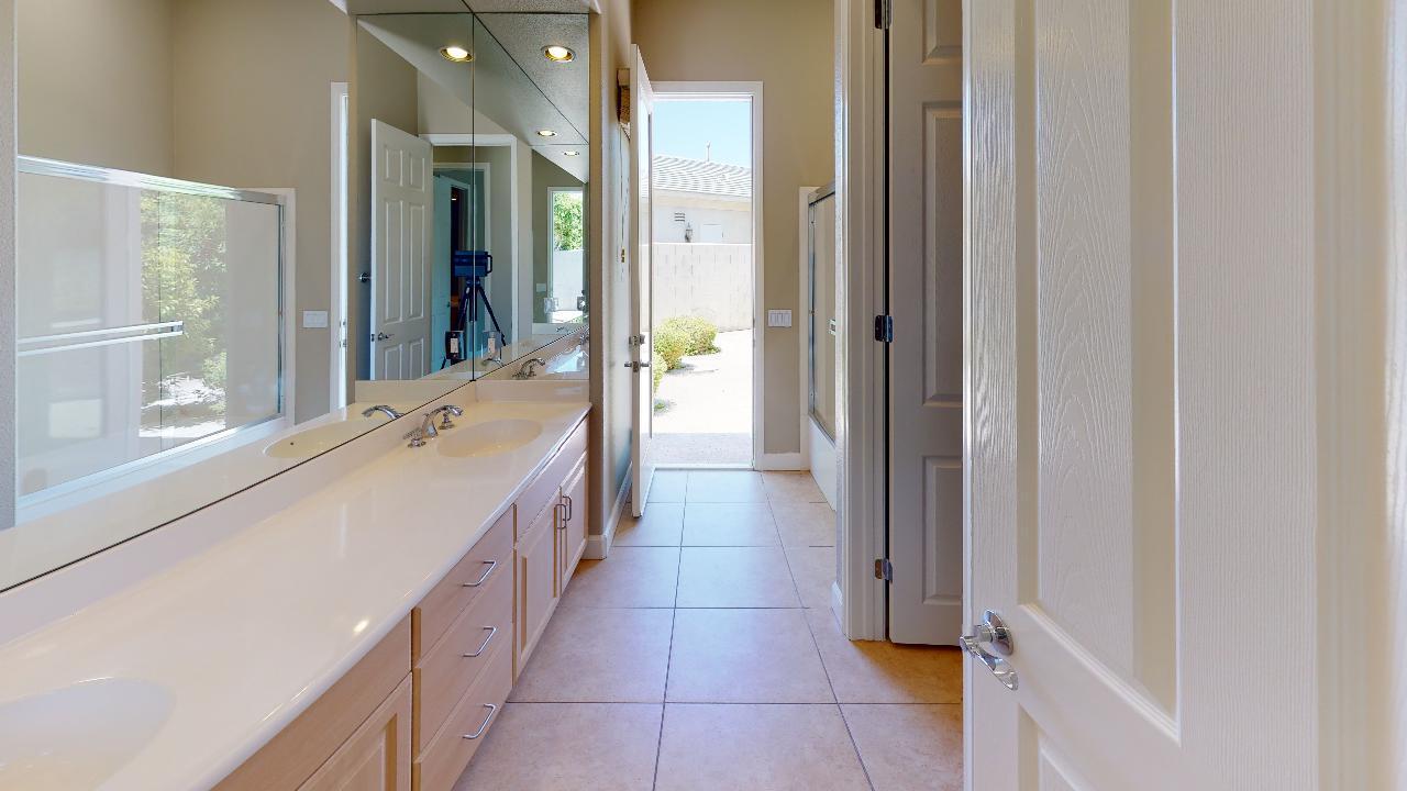 8 Picasso Court Rancho Mirage, CA 92270 - Photo 12 of 26 a bathroom with a bathtub and a sink