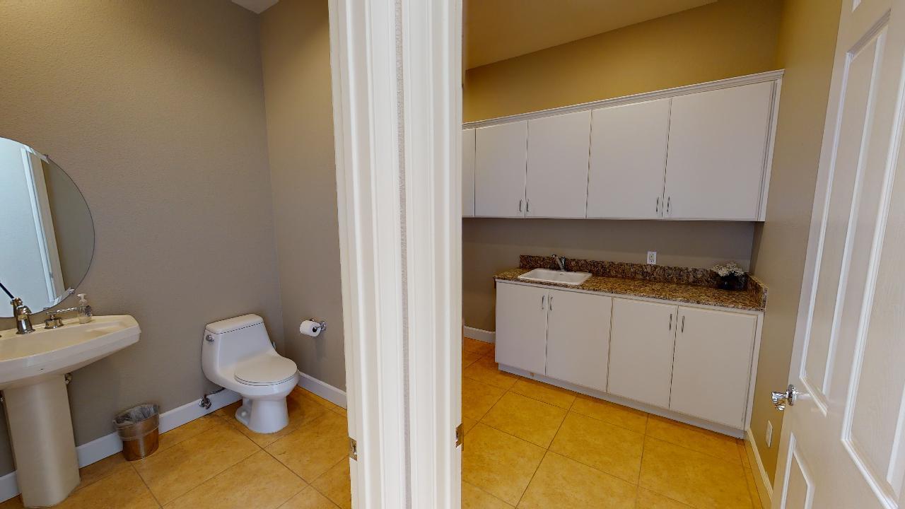 8 Picasso Court Rancho Mirage, CA 92270 - Photo 15 of 26 a bathroom with a sink and a toilet