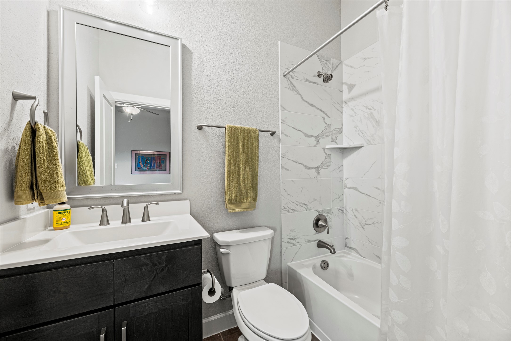 3127 Swift Way Katy, TX 77493 - Photo 20 of 25 Guest suite bathroom with a tub/shower combination.