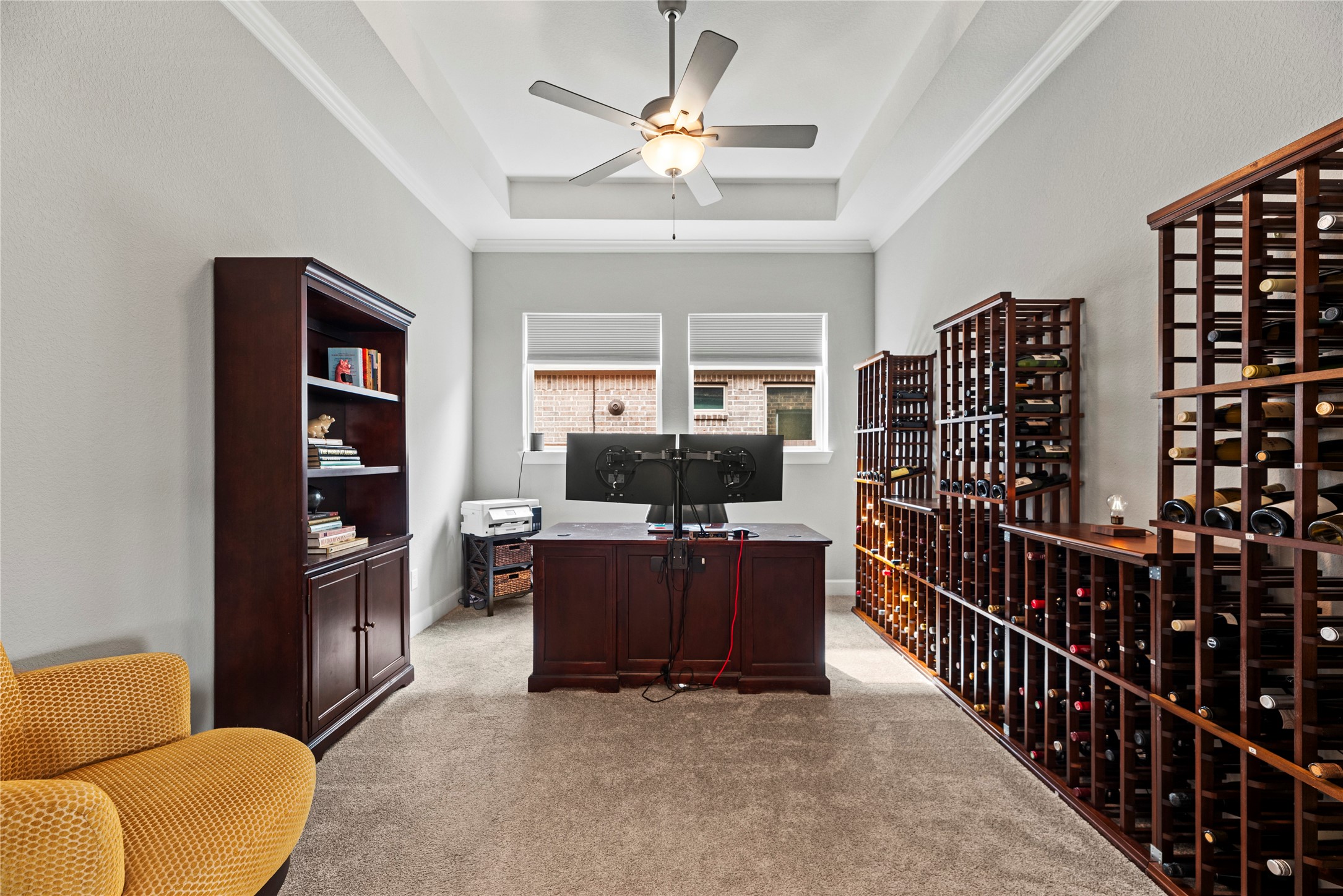 3127 Swift Way Katy, TX 77493 - Photo 8 of 25 Home office with a tray ceiling, crown molding, ceiling fan and double glass doors for privacy.