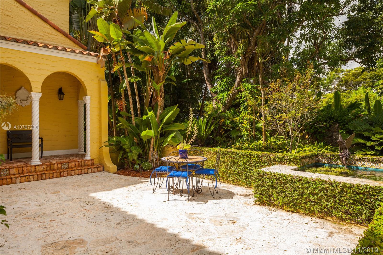 13599 Old Cutler Road Pinecrest, FL 33156 - Photo 28 of 40 Ivy frames the calming fountain