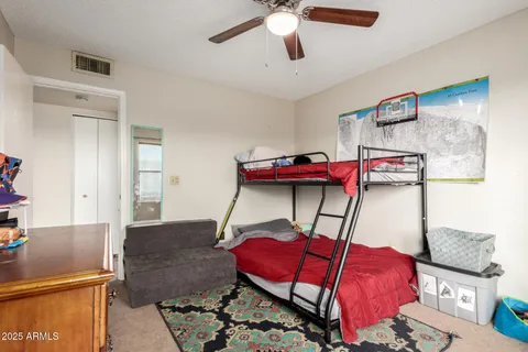 a bedroom with furniture and a bed