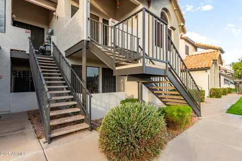 front view of a house with a small yard