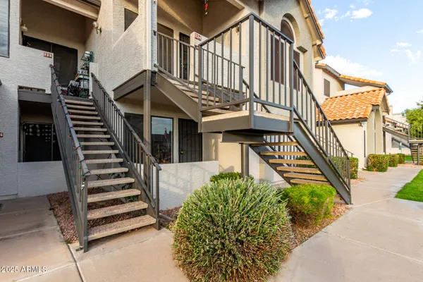 front view of a house with a small yard
