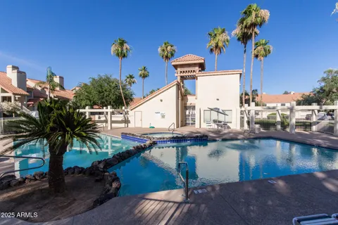 swimming pool view with sitting space
