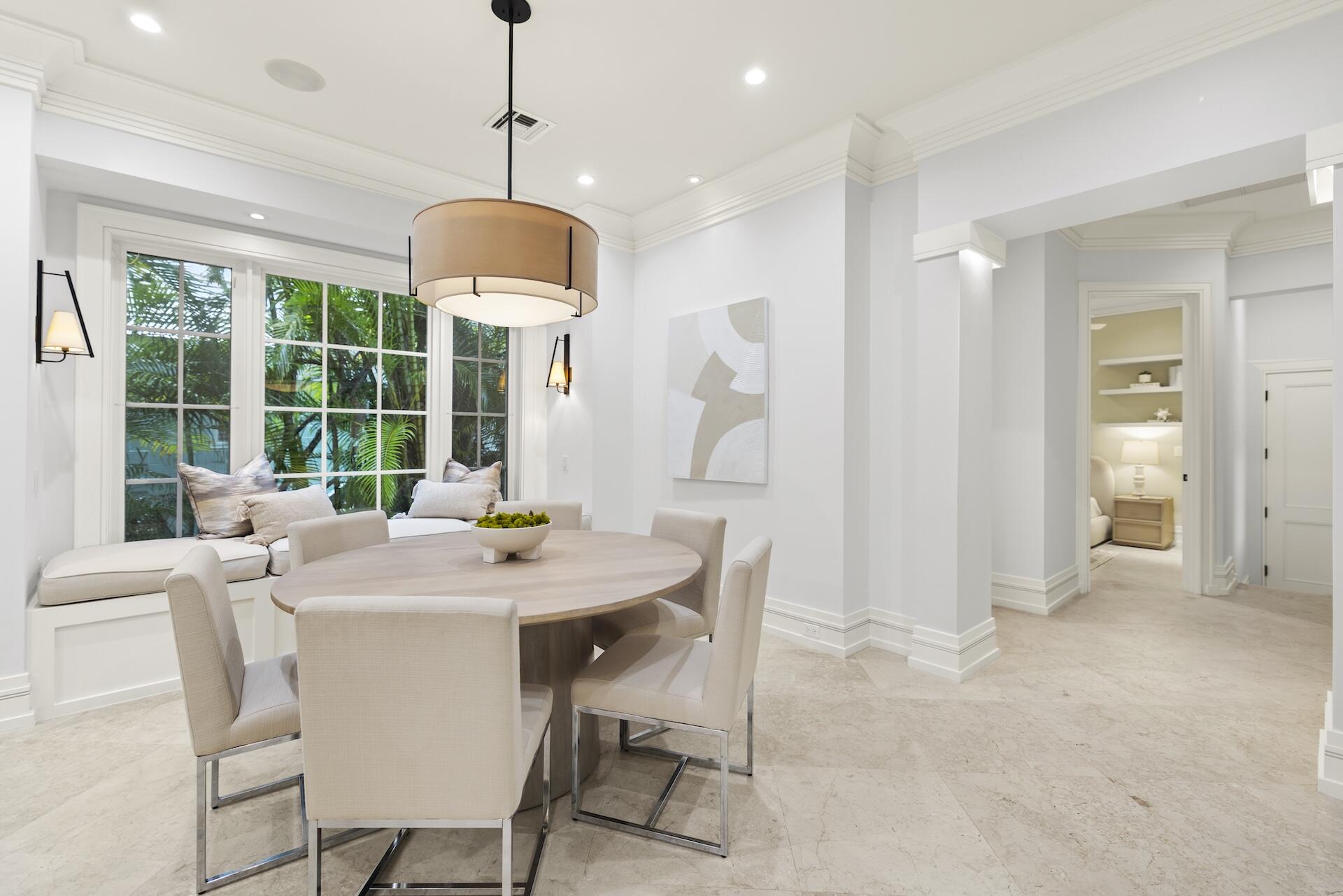 8 Osprey Drive Ocean Ridge, FL 33435 - Photo 12 of 51 a view of a dining room with furniture window and outside view