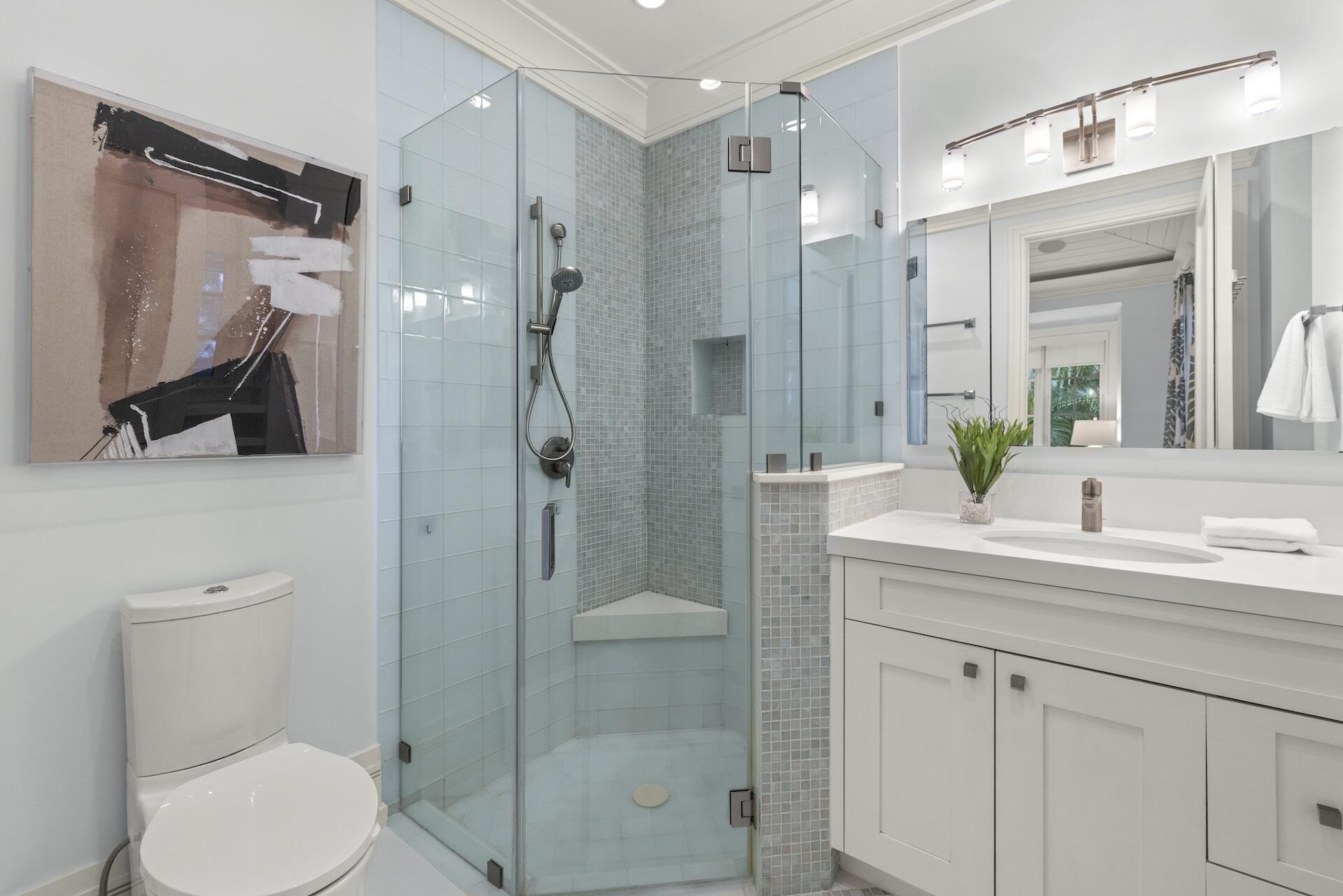 8 Osprey Drive Ocean Ridge, FL 33435 - Photo 17 of 51 a bathroom with a sink toilet and shower