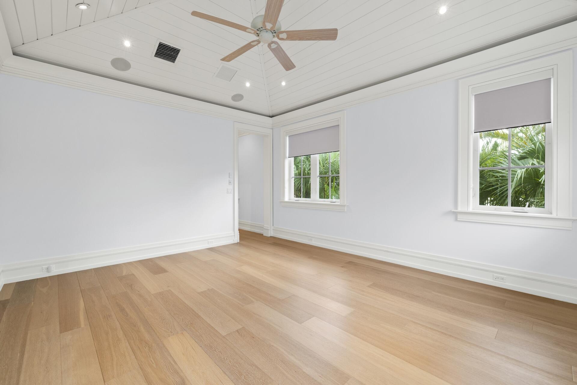 8 Osprey Drive Ocean Ridge, FL 33435 - Photo 28 of 51 a view of an empty room with a window and wooden floor