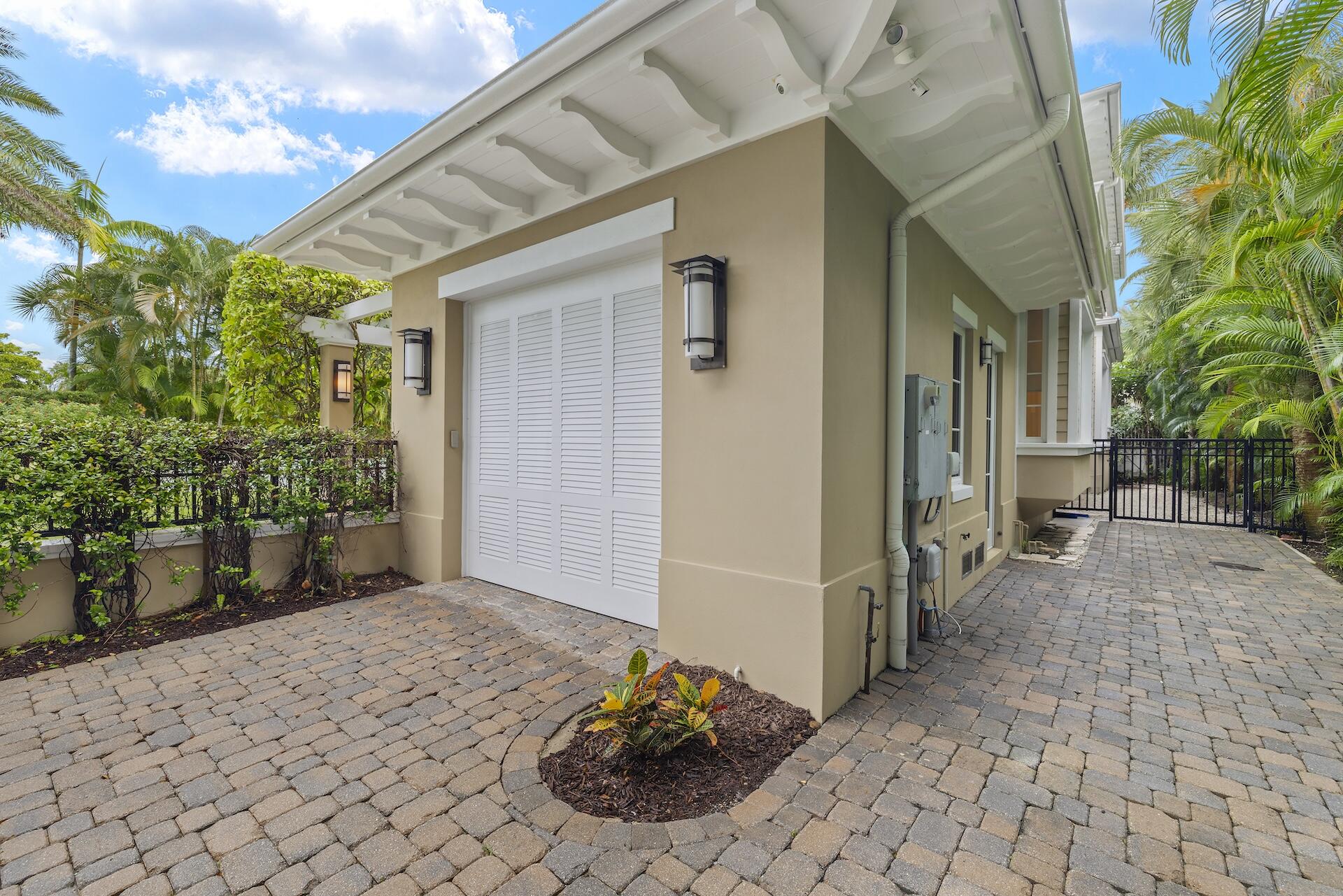 8 Osprey Drive Ocean Ridge, FL 33435 - Photo 34 of 51 a view of a entryway door front of house