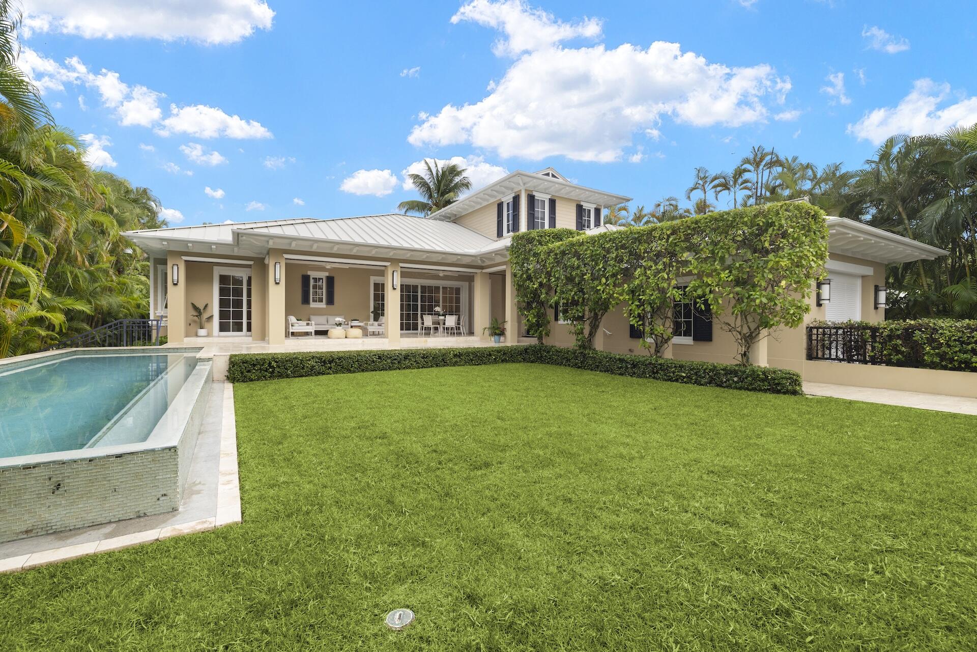 8 Osprey Drive Ocean Ridge, FL 33435 - Photo 37 of 51 a view of a house with a yard porch and sitting area