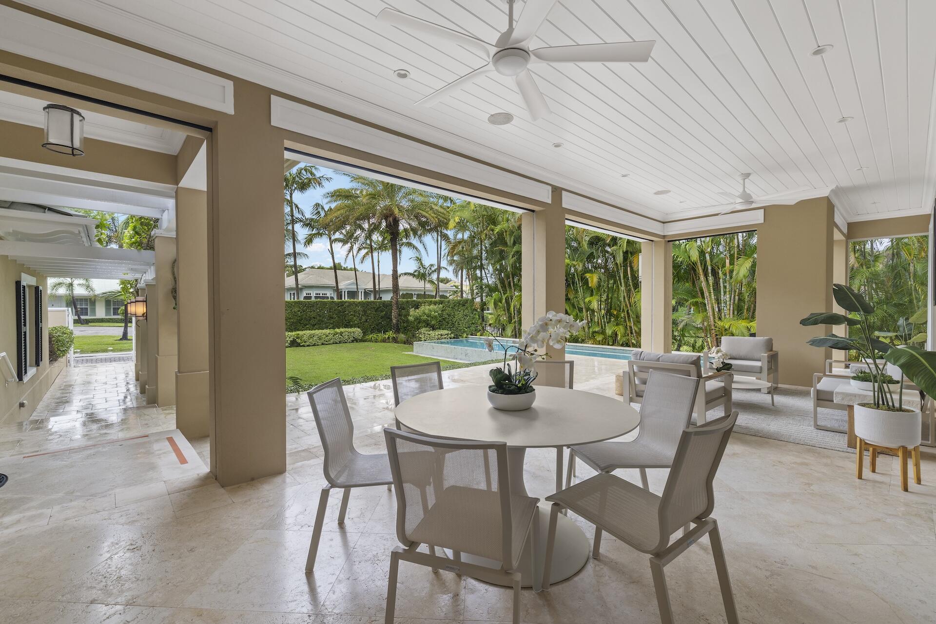 8 Osprey Drive Ocean Ridge, FL 33435 - Photo 4 of 51 a view of a dining room with furniture window and outside view