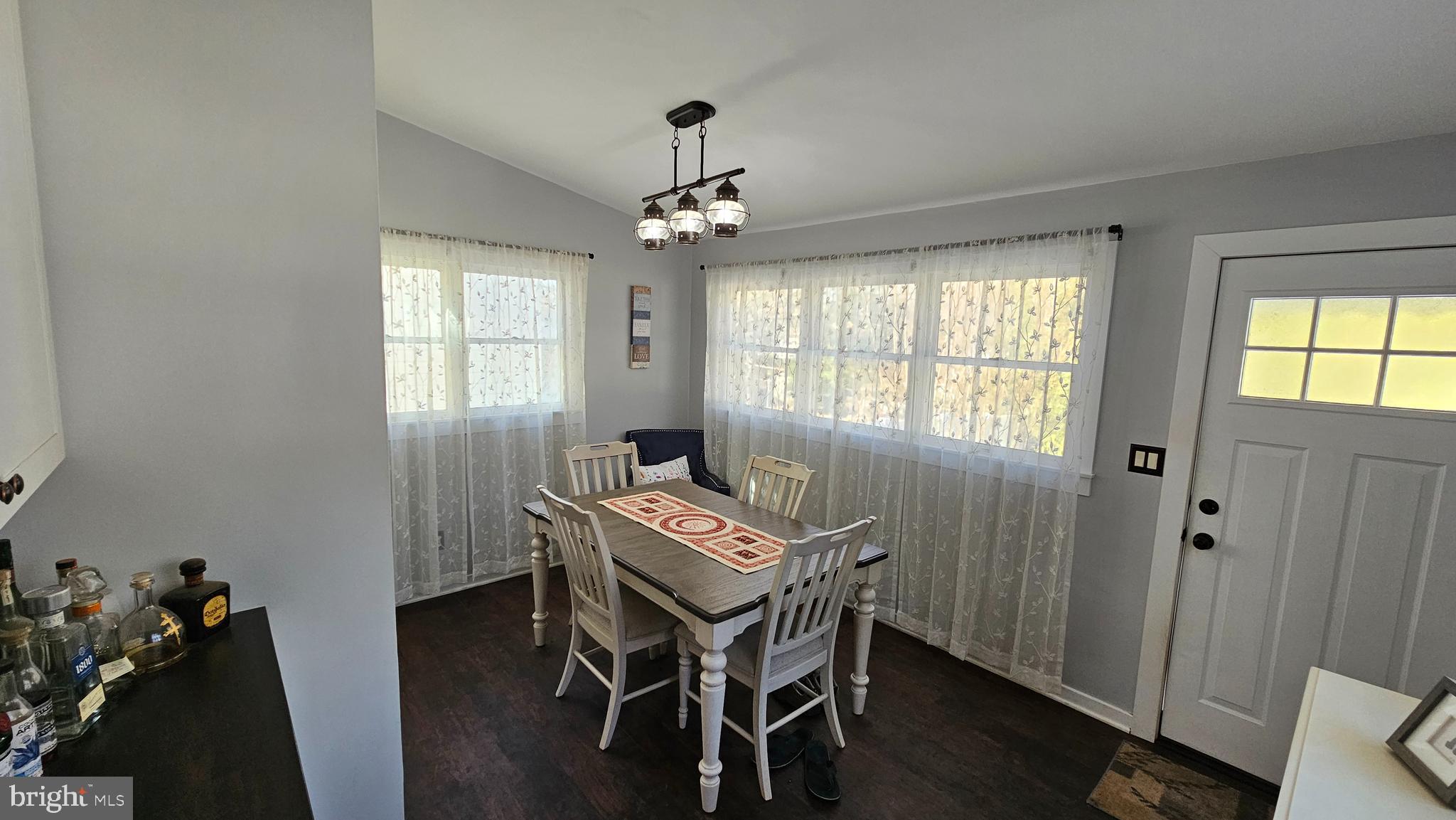 74 Ribsam Street Hamilton, NJ 08619 - Photo 15 of 35 a room with furniture a chandelier and wooden floor