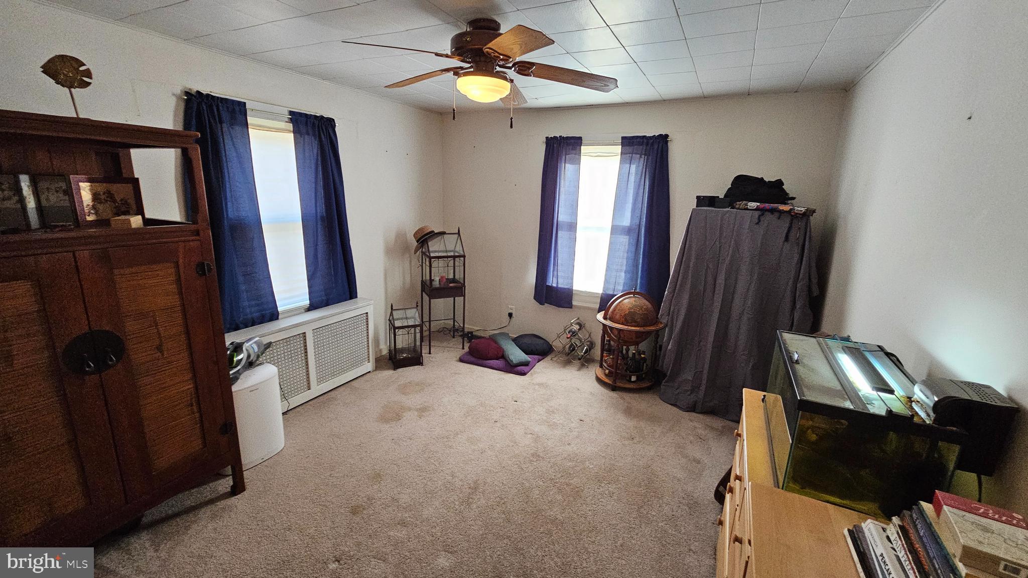 74 Ribsam Street Hamilton, NJ 08619 - Photo 16 of 35 a view of a room with gym equipment