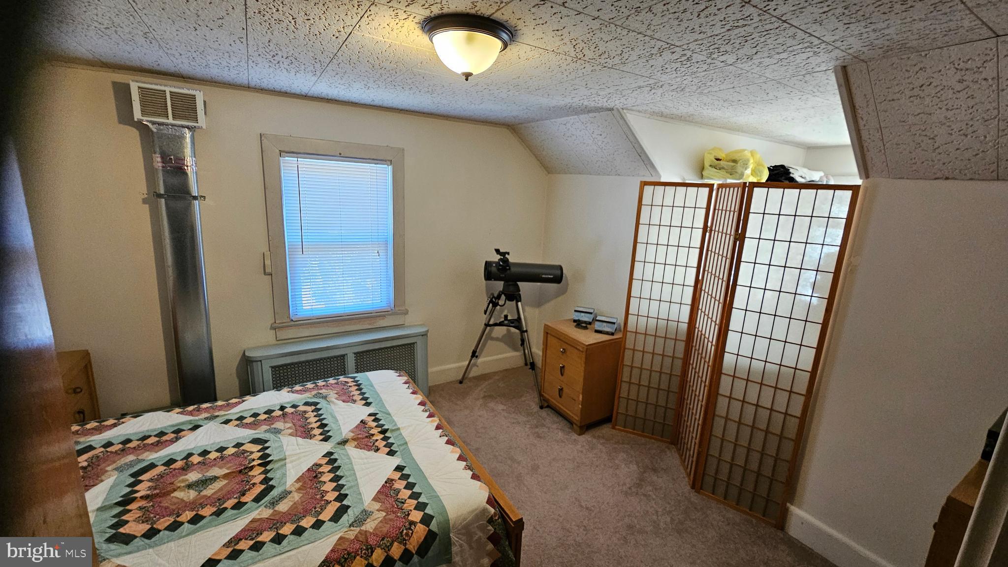 74 Ribsam Street Hamilton, NJ 08619 - Photo 24 of 35 a bedroom with a bed and a window