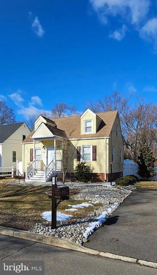 74 Ribsam Street Hamilton, NJ 08619 - Photo 4 of 35 a front view of a house with a yard