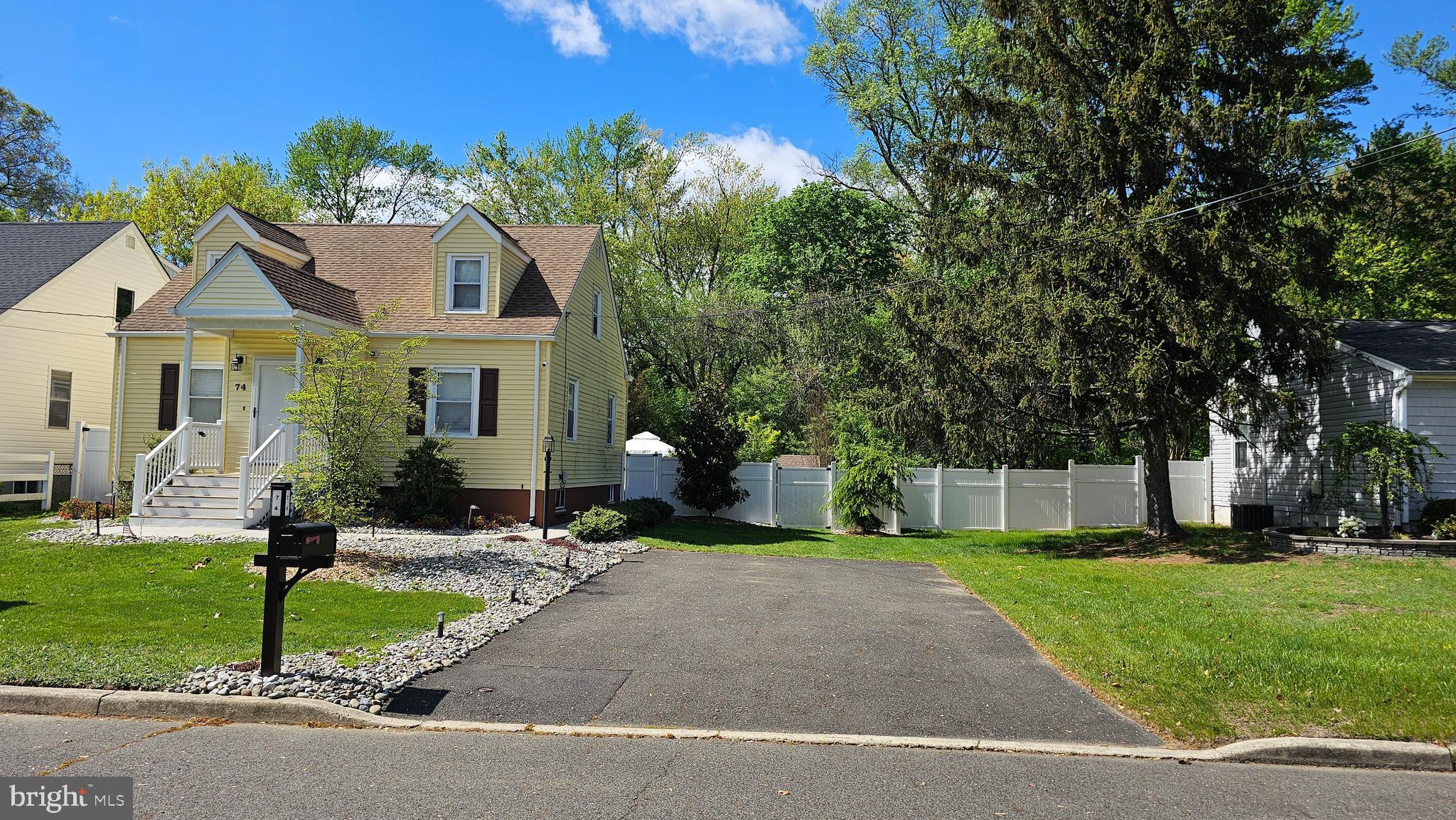74 Ribsam Street Hamilton, NJ 08619 - Photo 8 of 35 a front view of house with yard and green space