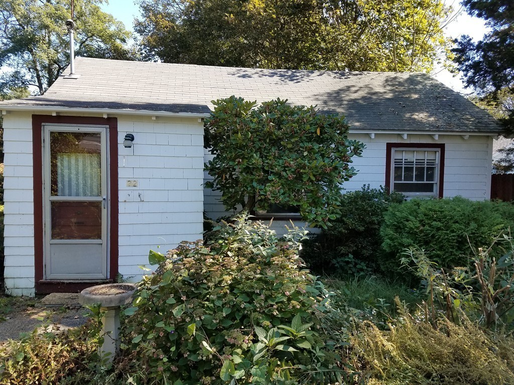 20 Nye Road Falmouth, MA 02540 - Photo 5 of 10 a view of a house with a small yard and plants