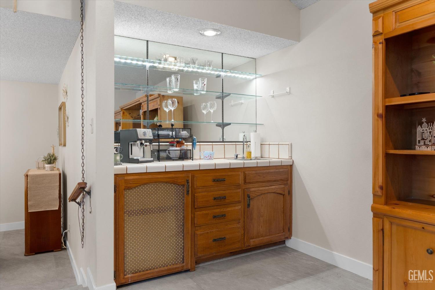 Undisclosed Address Bakersfield, CA 93309 - Photo 17 of 35 a room with storage and utility