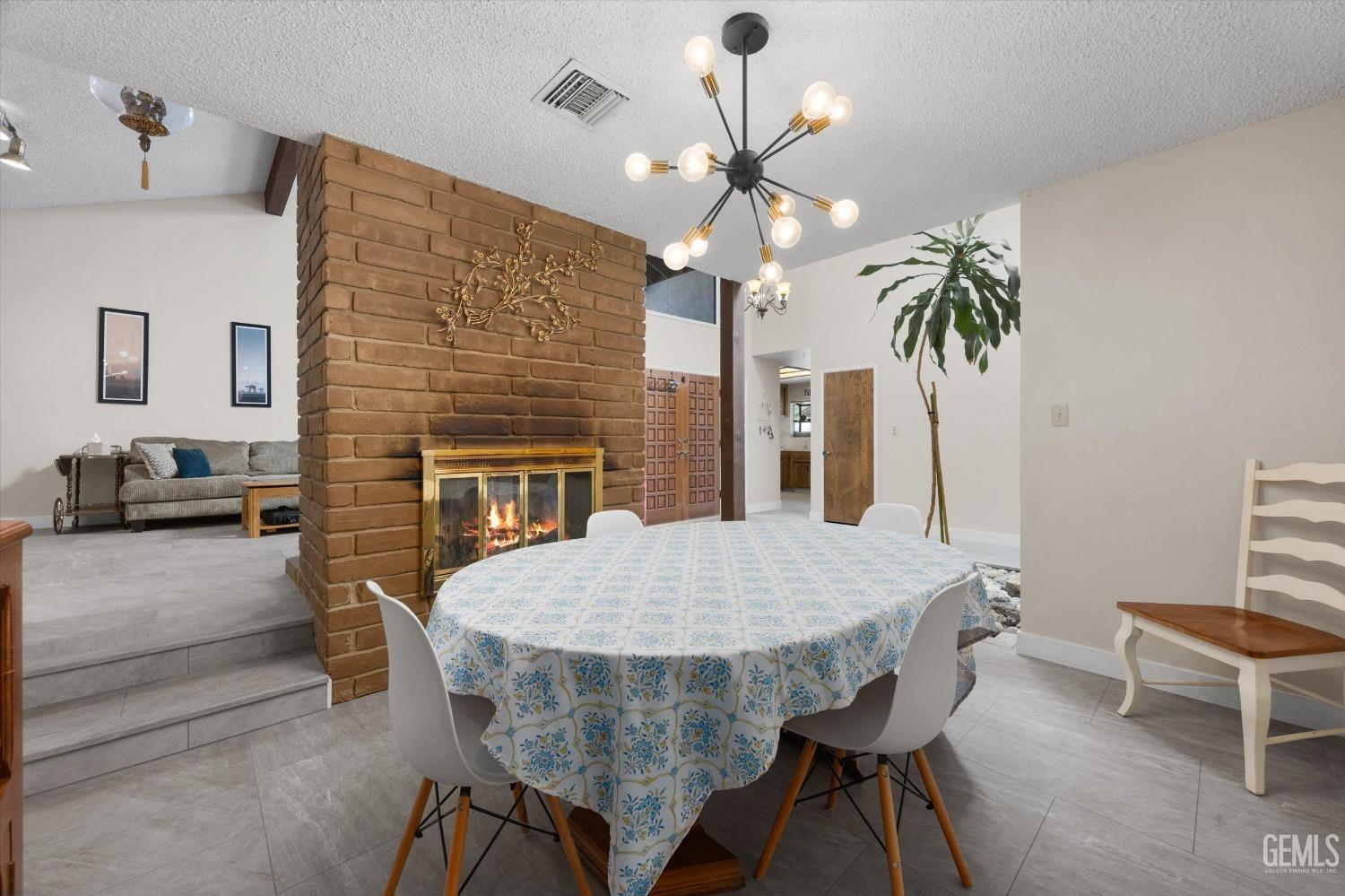 Undisclosed Address Bakersfield, CA 93309 - Photo 18 of 35 a view of a livingroom with furniture and a chandelier