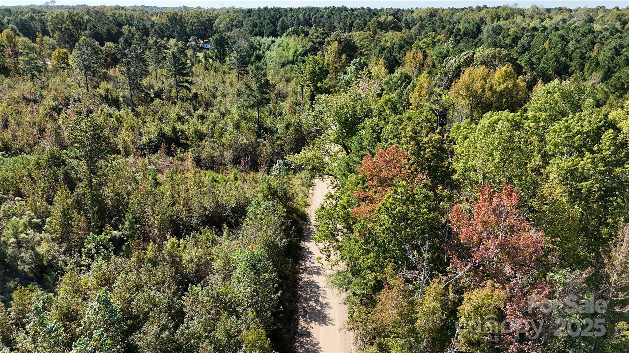 Lot 25 Farris Cato Road Pageland, SC 29728 - Photo 19 of 27 an aerial view of residential house with green space and trees all around