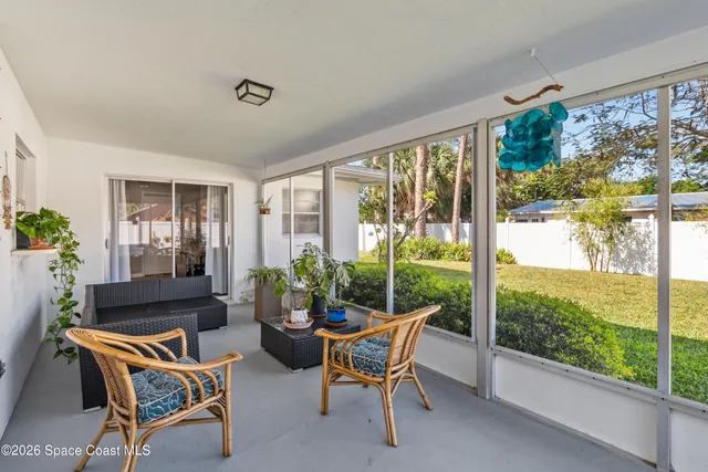 a outdoor living space with furniture and garden view