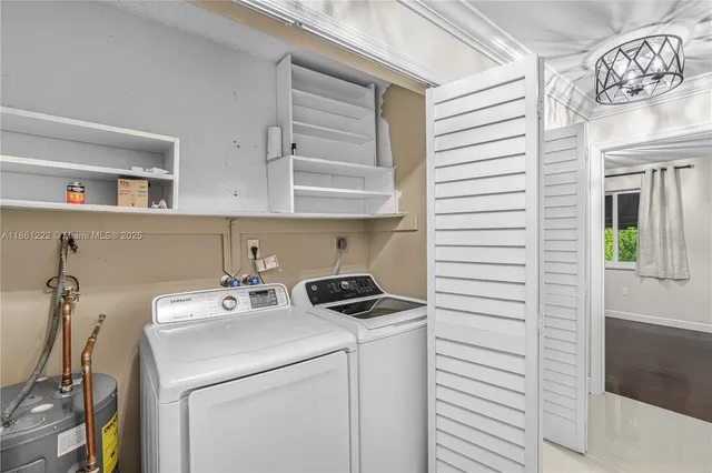 a view of a porch with chairs and potted plants