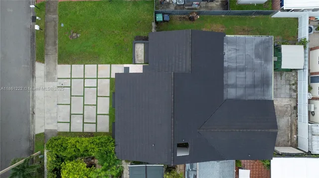 an aerial view of city and lake