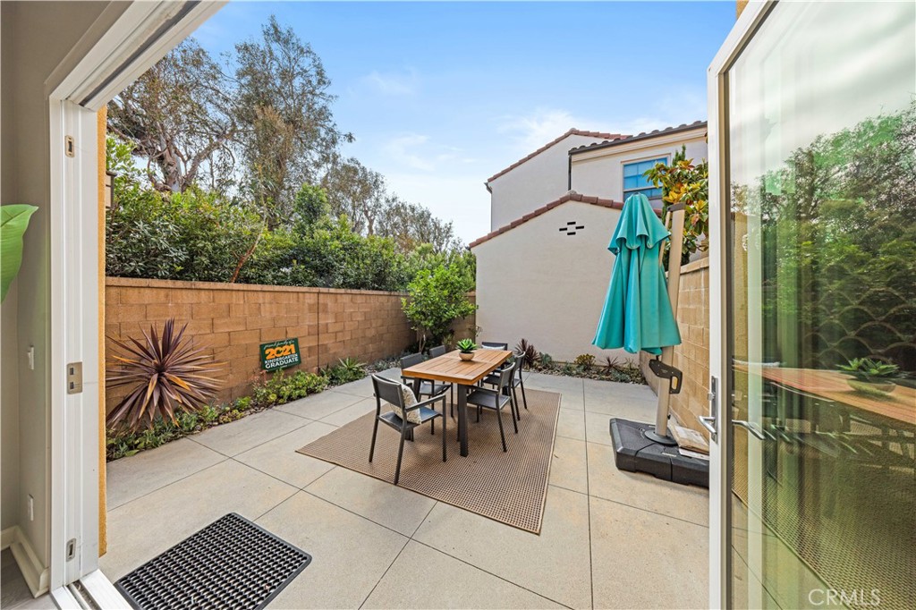 105 Copeland Irvine, CA 92618 - Photo 11 of 46 a view of a patio with a table and chairs