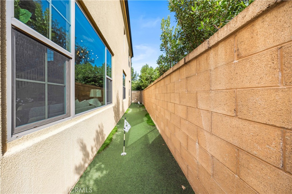 105 Copeland Irvine, CA 92618 - Photo 15 of 46 a view of a balcony with wooden floor and fence