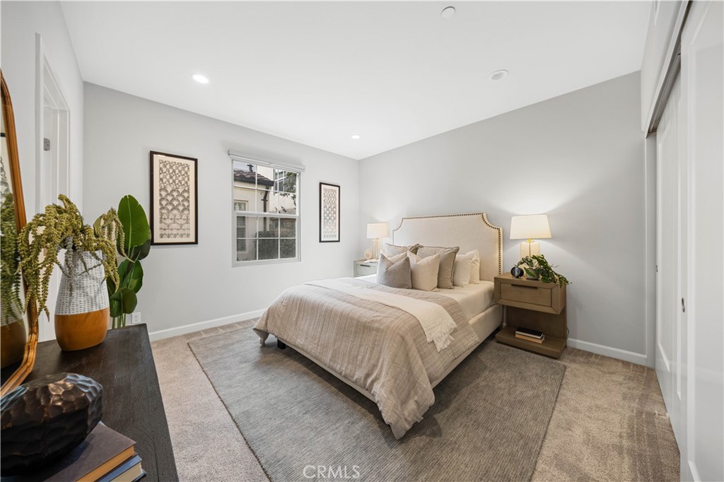 105 Copeland Irvine, CA 92618 - Photo 22 of 46 a bedroom with a bed and a window