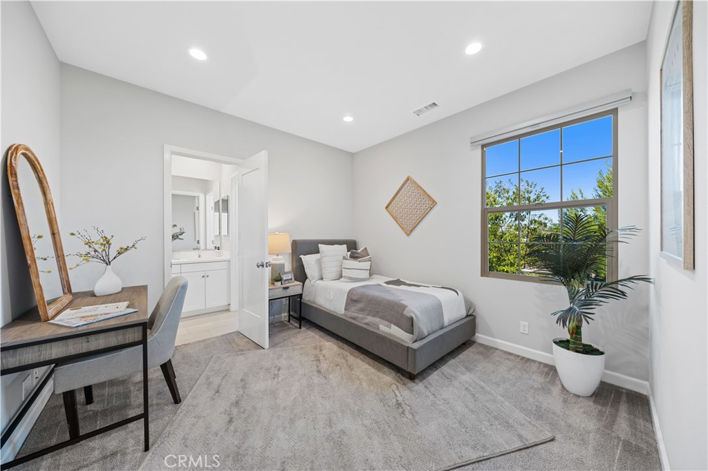 105 Copeland Irvine, CA 92618 - Photo 27 of 46 a living room with furniture and a potted plant