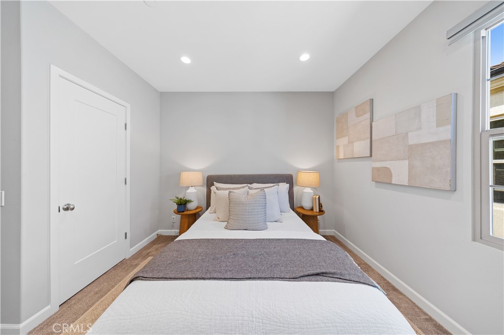105 Copeland Irvine, CA 92618 - Photo 31 of 46 a bedroom with a bed and a window