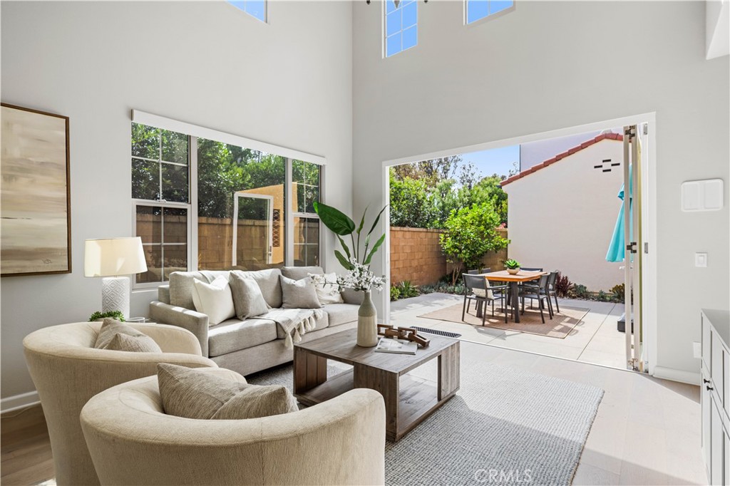 105 Copeland Irvine, CA 92618 - Photo 6 of 46 a living room with furniture and a large window