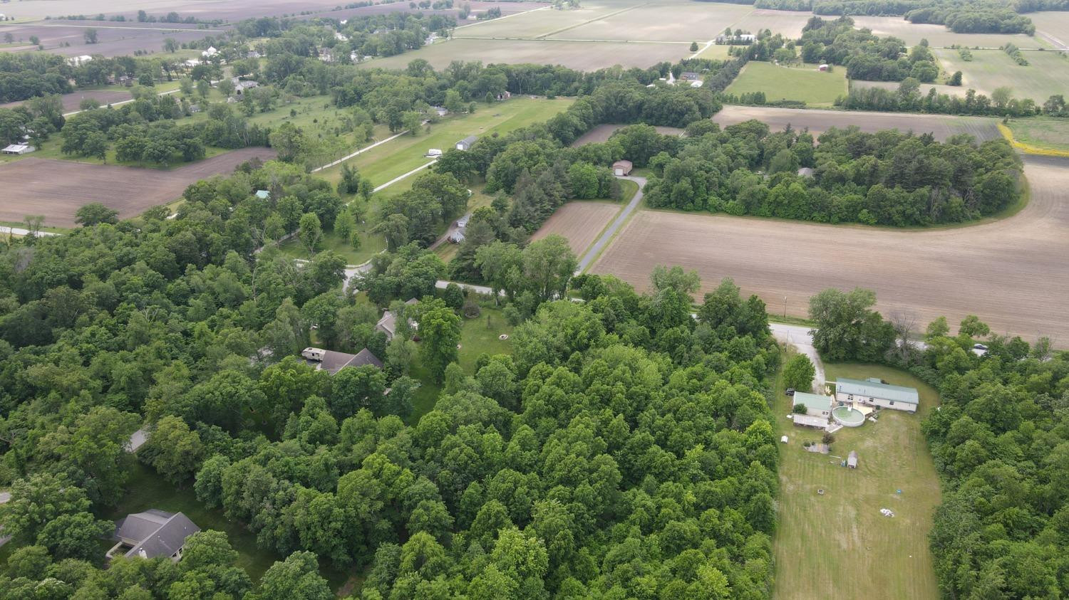 18-acres 18-acres 950th Street West Demotte, IN 46310 - Photo 12 of 17 an aerial view of residential house with outdoor space and trees all around