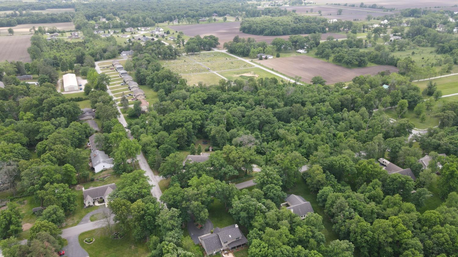 18-acres 18-acres 950th Street West Demotte, IN 46310 - Photo 13 of 17 an aerial view of residential houses with outdoor space and trees