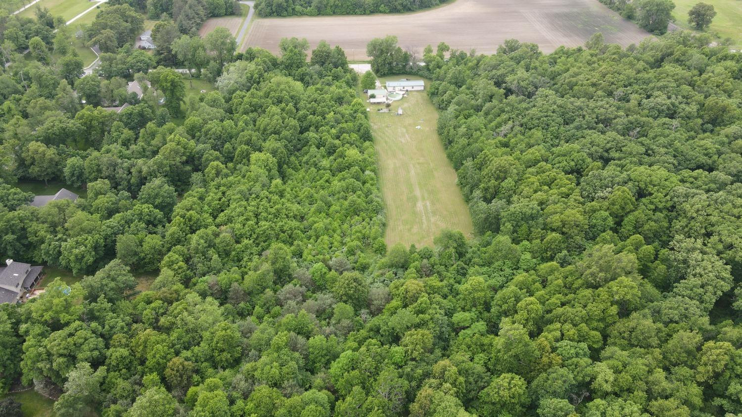18-acres 18-acres 950th Street West Demotte, IN 46310 - Photo 14 of 17 a view of a forest with a house