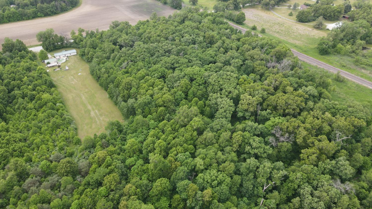 18-acres 18-acres 950th Street West Demotte, IN 46310 - Photo 15 of 17 an aerial view of a house with a yard