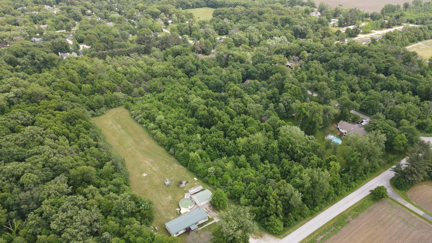 18-acres 18-acres 950th Street West Demotte, IN 46310 - Photo 5 of 17 a view of a forest from a balcony