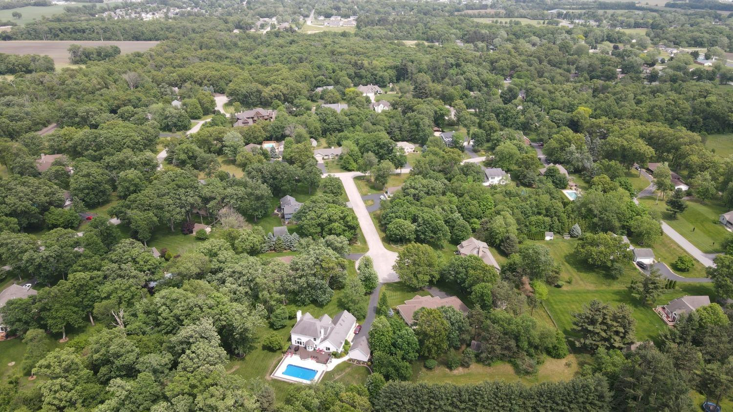 18-acres 18-acres 950th Street West Demotte, IN 46310 - Photo 10 of 17 a view of a houses with a lush green forest