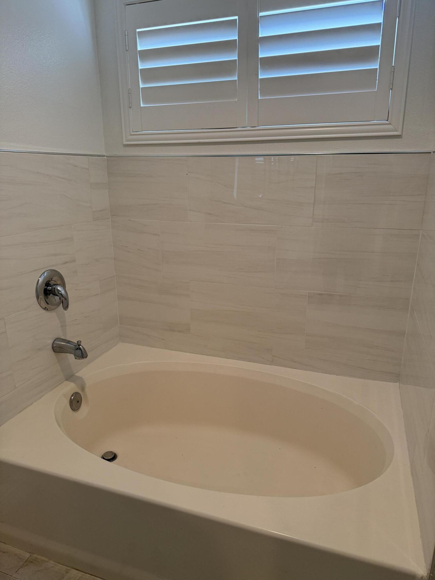 32790 Aurora Vista Road Cathedral City, CA 92234 - Photo 13 of 18 a bathroom with a bathtub