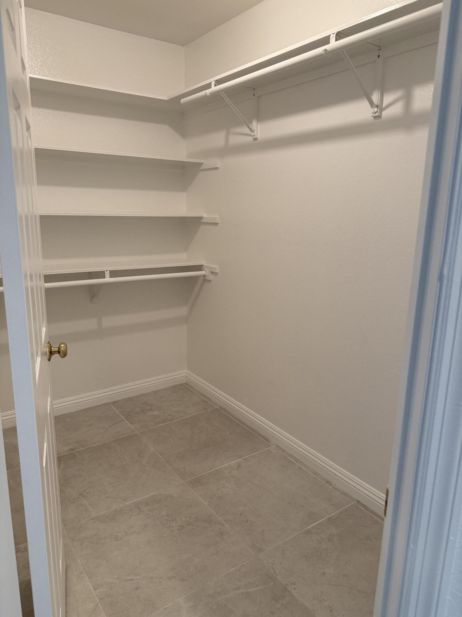 32790 Aurora Vista Road Cathedral City, CA 92234 - Photo 14 of 18 a view of an empty walk in closet