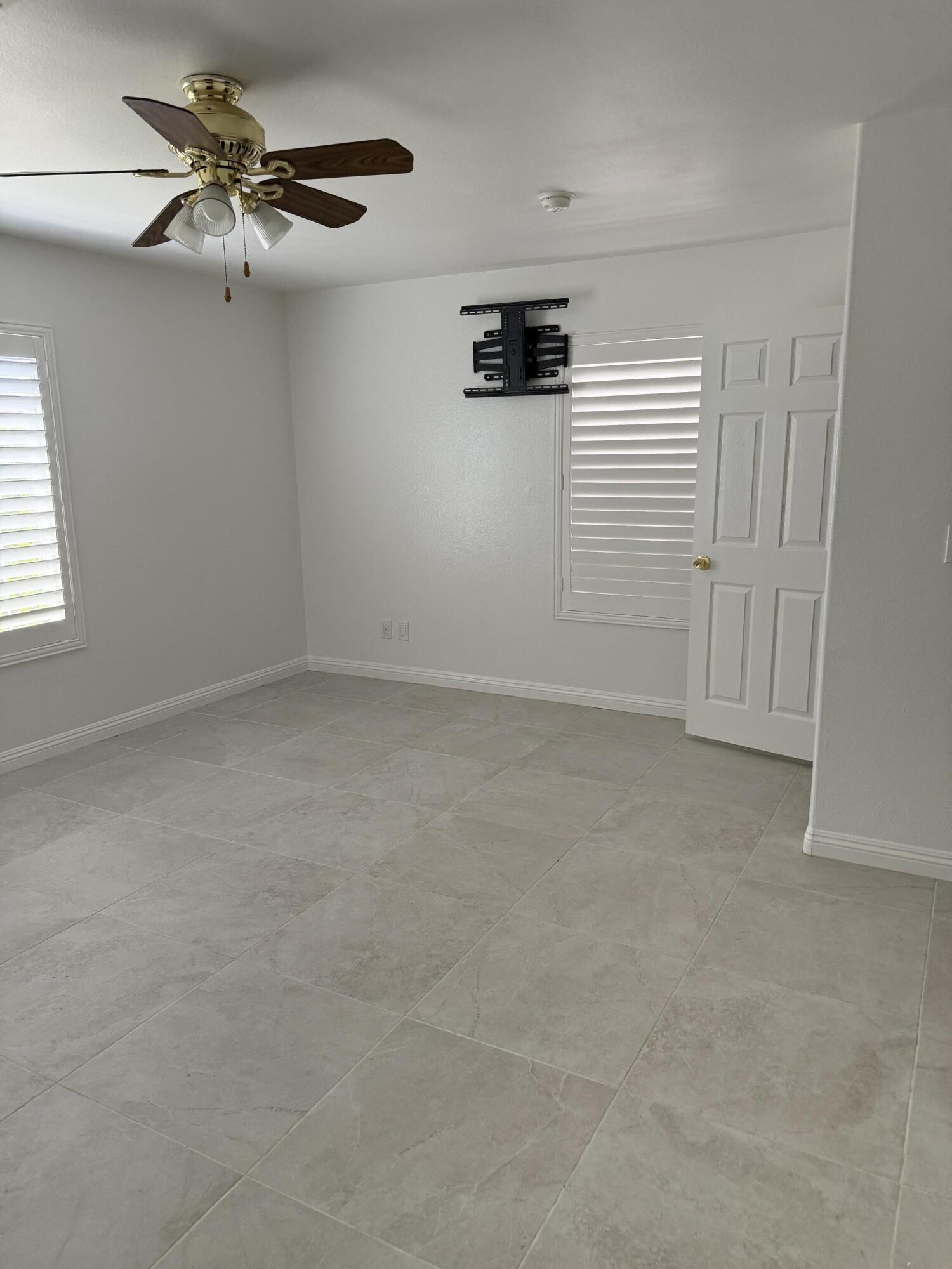 32790 Aurora Vista Road Cathedral City, CA 92234 - Photo 3 of 18 a view of an empty room with a window
