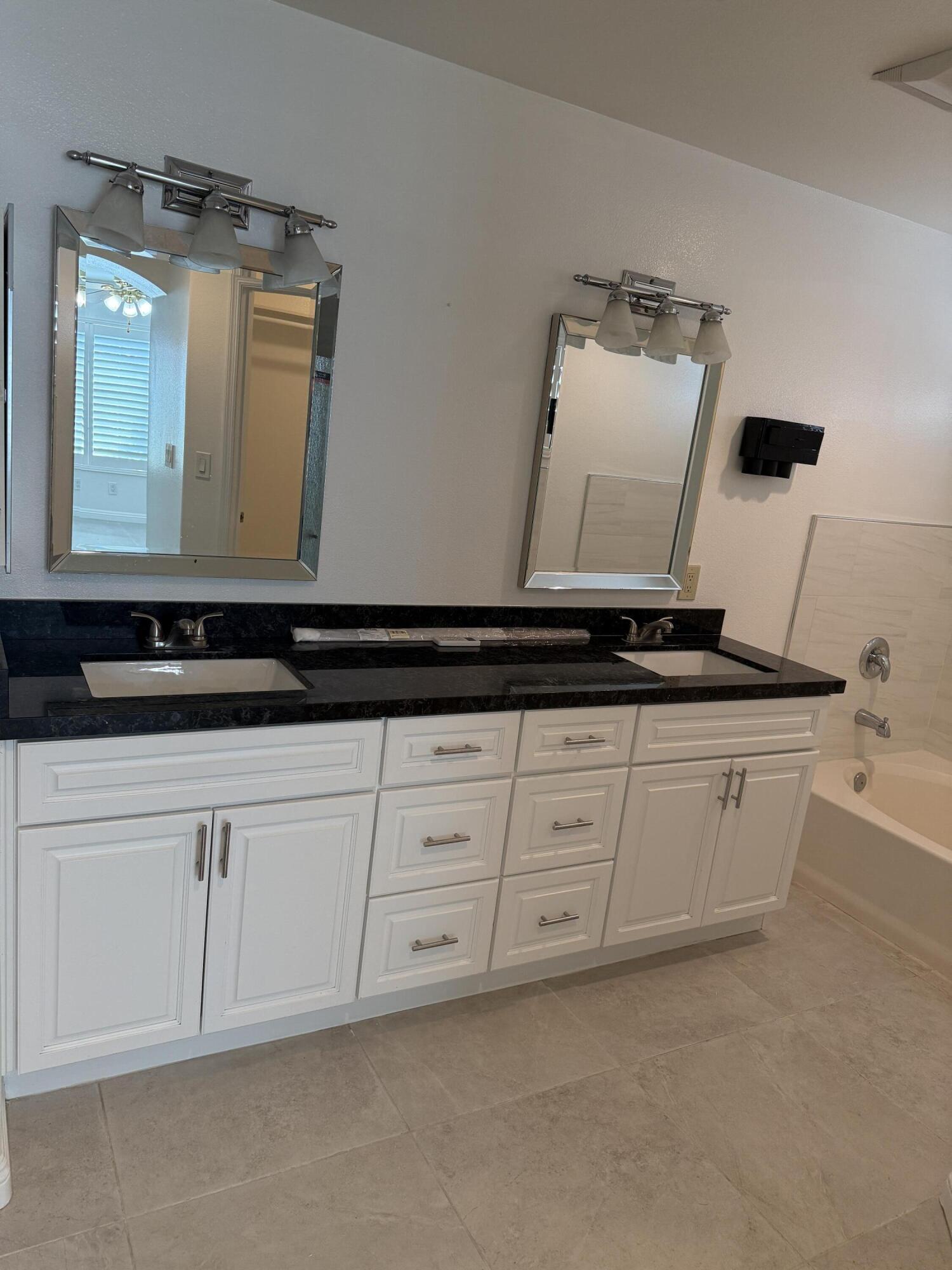 32790 Aurora Vista Road Cathedral City, CA 92234 - Photo 5 of 18 a bathroom with a sink and a mirror