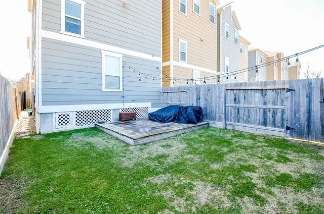 a view of a backyard with plants